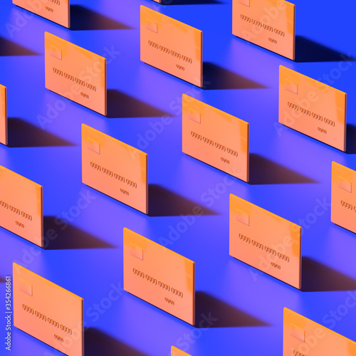 A pattern of orange credit cards is lined up on a dark blue background. 3D render.