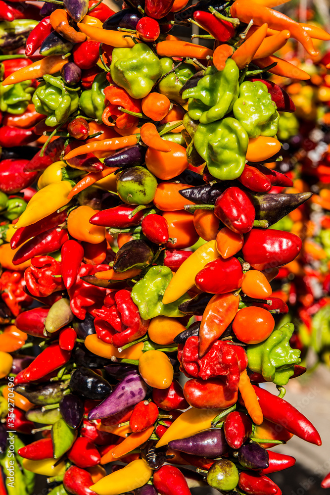 Mixed peppers for sale, on display in the sunshine at Sinue market in  Mallorca, Spain.