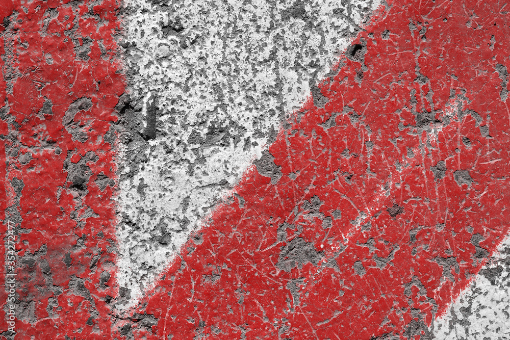 Old red and white painted asphalt texture Old red and white painted asphalt texture