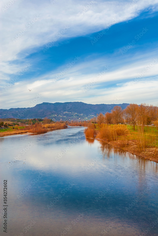 Winter view of River Serchio near the city of Lucca in Tuscany