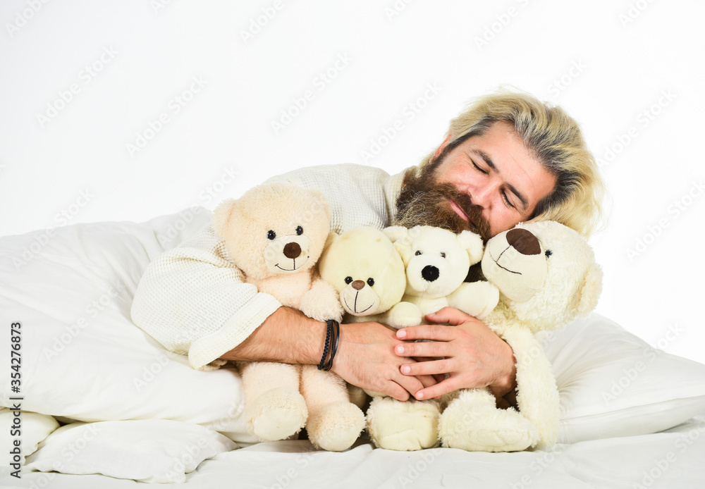 Happy Valentines day. Sick man with flu sleeping in the bed. sleeping at home in bed with his toy. man sleeping in embrace with white teddy bear. Handsome hipster hold lovely bear toy Happy Valentines day. Sick man with flu sleeping in the bed. sleeping at home in bed with his toy. man sleeping in embrace with white teddy bear. Handsome hipster hold lovely bear toy