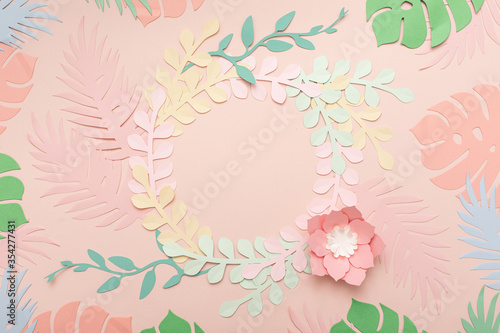 Paper art pink background with flowers and tropical leaves. Fashion floral gr...