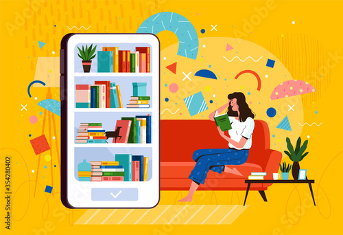 Young woman sits on a sofa and reads a book from a mobile library on the phone. E-book reader and distance learning concept