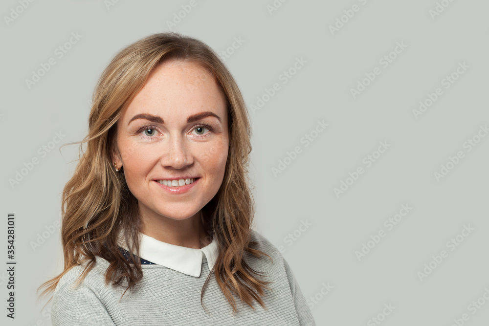 Attractive woman smiling on white background, portrait Attractive woman smiling on white background, portrait