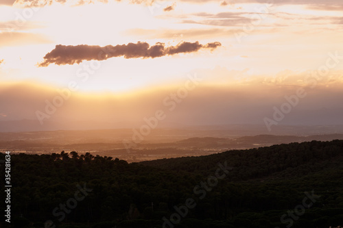 dramatic sky at sunset in girona