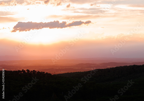 dramatic sky at sunset in girona