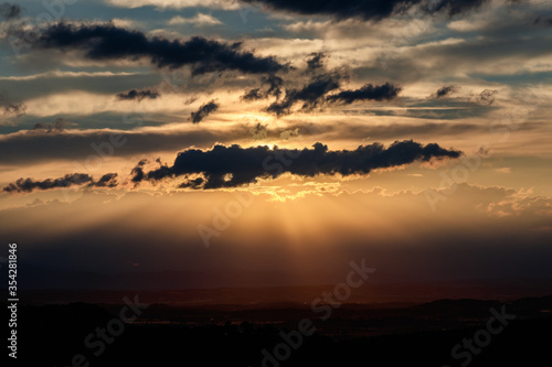 dramatic sky at sunset in girona © larrui