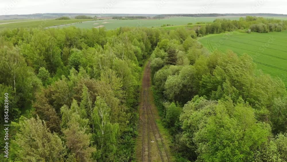 Old railway in the little forest. 4k drone video Old railway in the little forest. 4k drone video