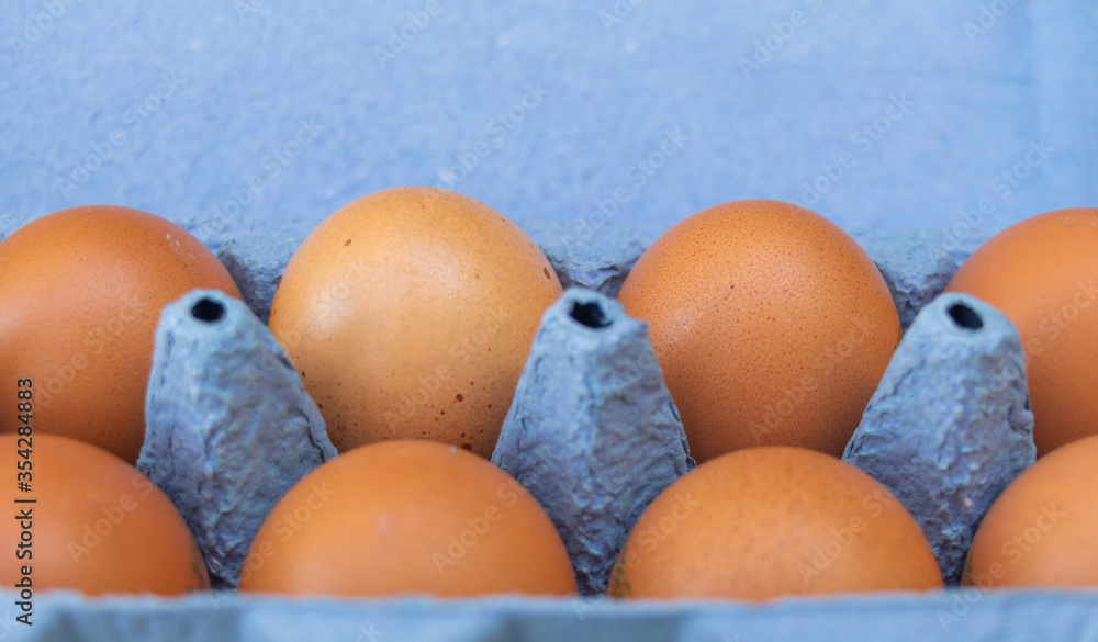 A box of chicken eggs close up A box of chicken eggs close up