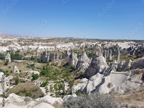 Cappadocia, view from the top of the mountain, Kapadokya, Turkey, Uchisar Castle in Cappadocia Region of Turkey, Aerial view of the balloons flying over Cappadocia
