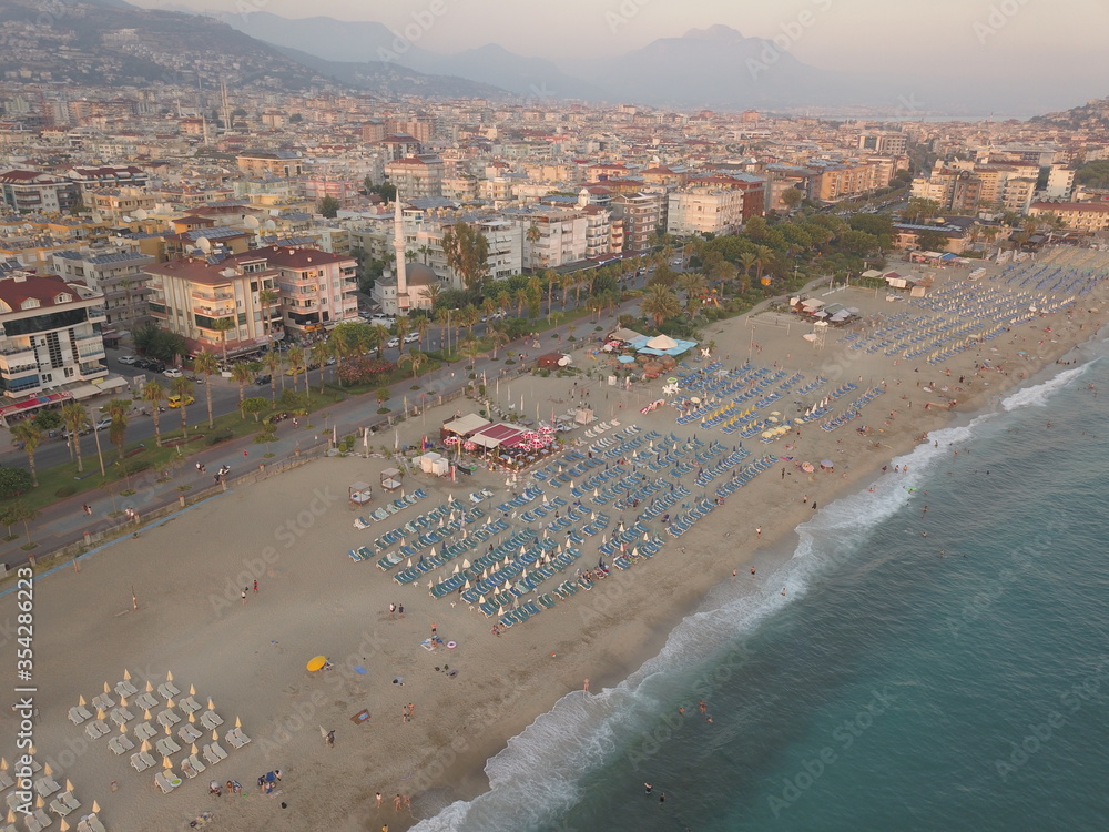 view of the coast of the mediterranean sea, view of the beach, waves on the beach, turkey, alanya, Mediterranean sea, travel around turkey