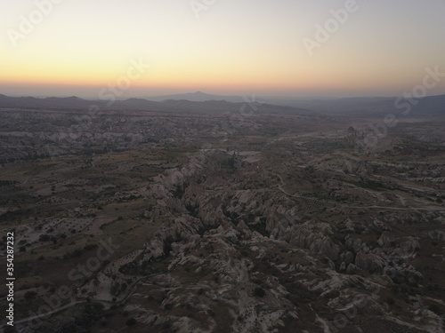 Cappadocia  view from the top of the mountain  Kapadokya  Turkey  Uchisar Castle in Cappadocia Region of Turkey  Aerial view of the balloons flying over Cappadocia