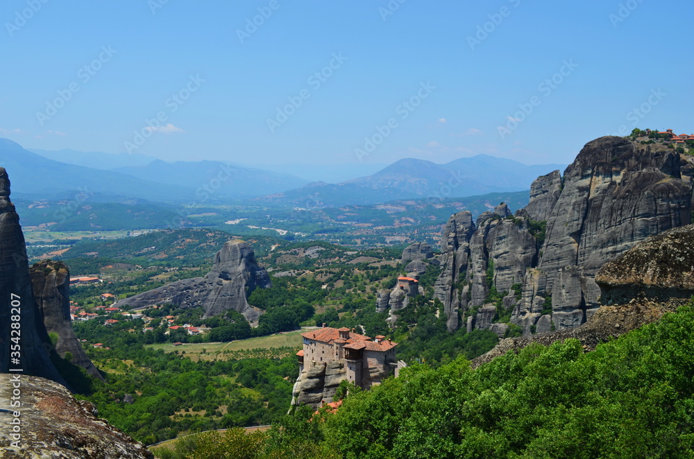 Beautiful landscape in sunny weather of monastery on the rocks of Meteora in Greece 