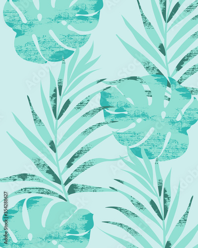 Palm leaves pattern on light blue background. Grunge design