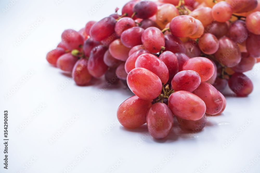 Red Grapes isolated on a white background Red Grapes isolated on a white background