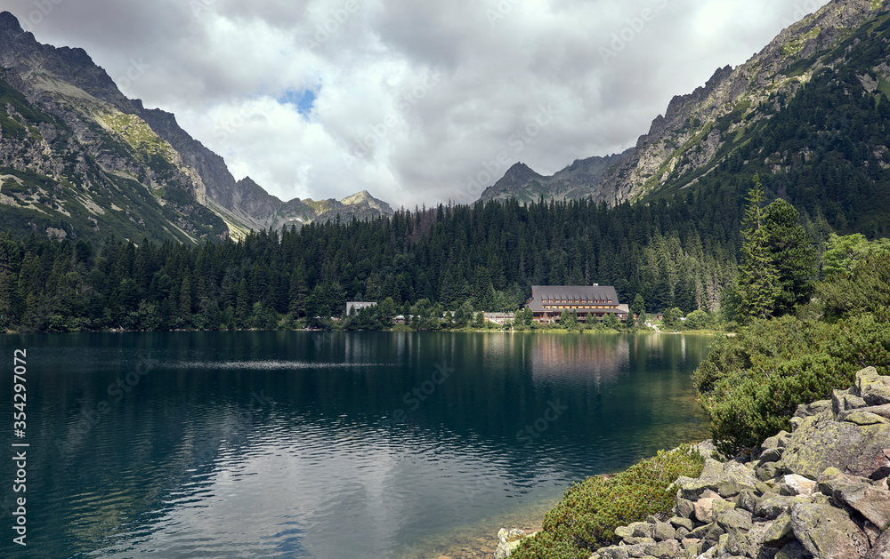 Photograph of a house and a lake in the Tatra Mountains, Slovakia.