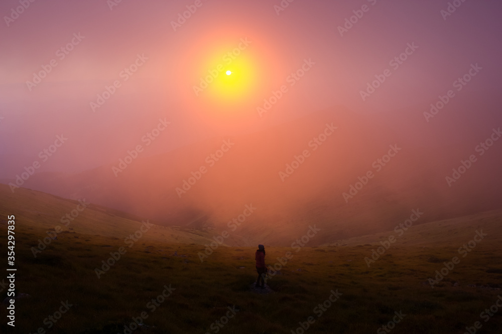 woman walking in fog woman walking in fog