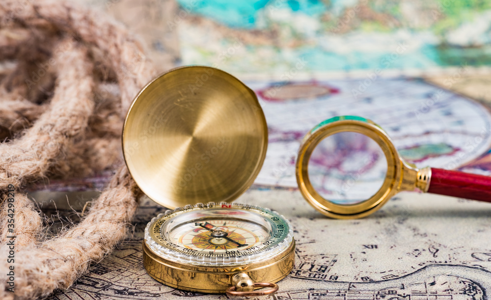 compass and magnifying glass compass and magnifying glass