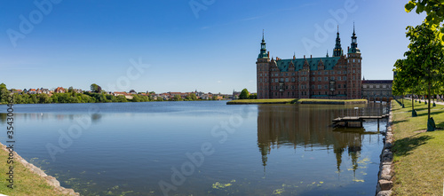 Panorama of frederiksborg castle in denmark with blue sky