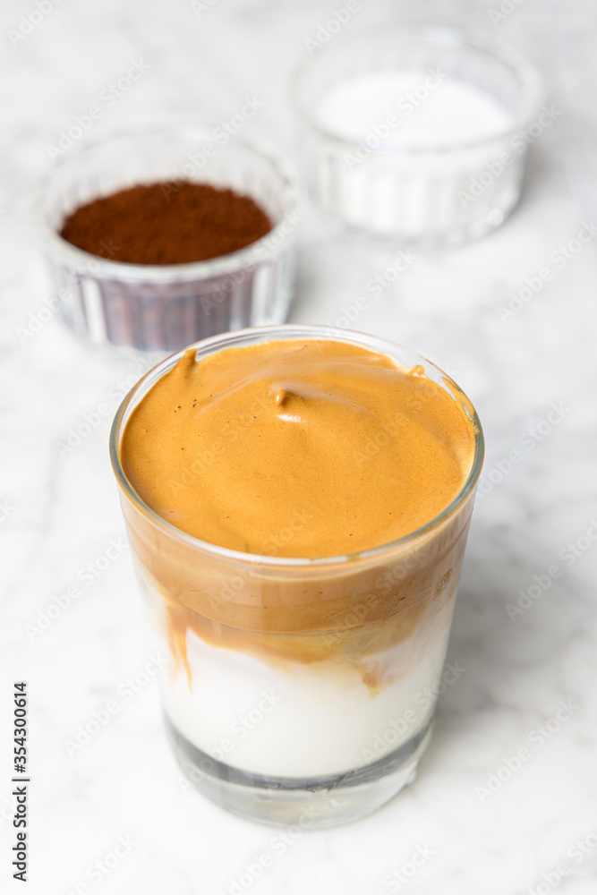 Iced Dalgona coffee, a very popular whipped coffee during the confinement of the Covid19 Iced Dalgona coffee, a very popular whipped coffee during the confinement of the Covid19