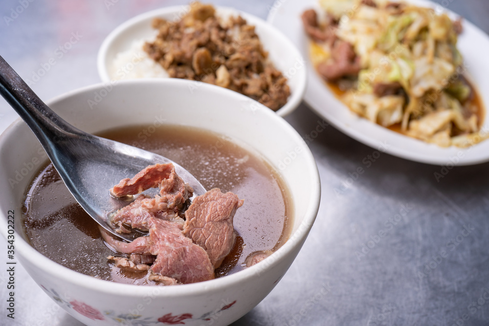 Beef soup - famous food in Taiwan, Asia, Asian Taiwanese street delicacy cuisine, close up, lifestyles, traditional breakfast in Tainan.