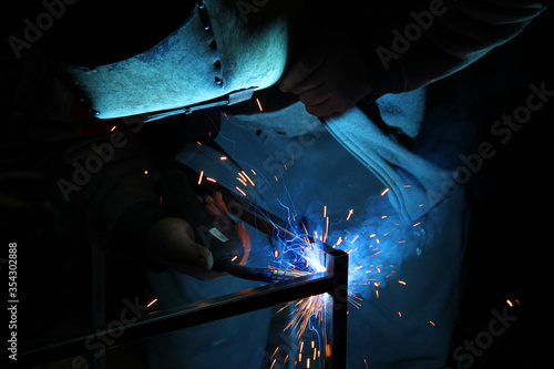Slika na platnu Sparks from welding