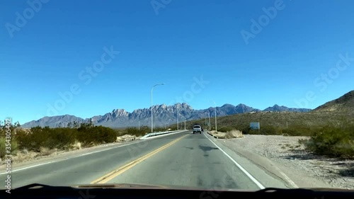 Driving on road towards Organ Mountains near Las Cruces New Mexico photo