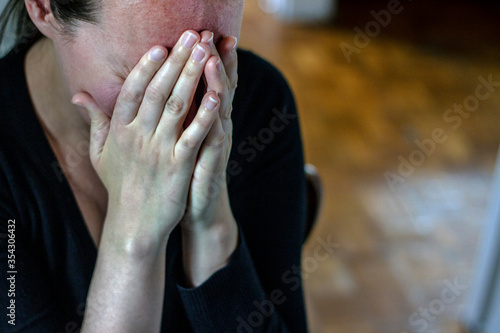 Wallpaper Mural Stressed woman cry. Worried crying young girl covering her face with hands. In Human emotions and expressions and mental health. Torontodigital.ca