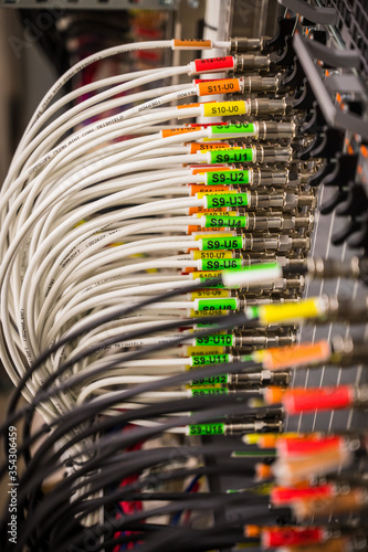 back panel of rock with network coaxial cables