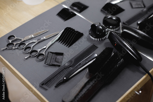 tools from the barber shop and barber shop,milling machine, scissors, comb