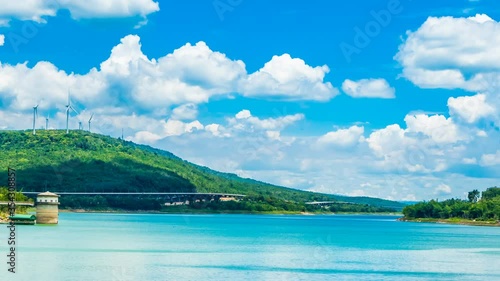 Wallpaper Mural 4K Time lapse of Landscape with cloud sky, wind turbine and river dam and motorway Bang Pa-in to Korat at Lam Takhong Dam in Nakhon Ratchasima Thailand Torontodigital.ca