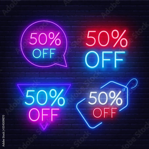 50 percent off set of neon signs on a dark background. Discount for sale promotion.