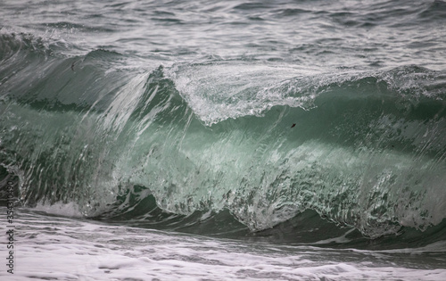 waves breaking on the rocks