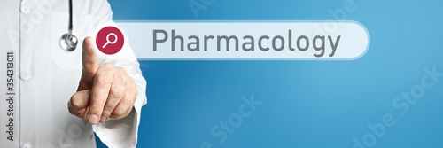 Pharmacology. Doctor in smock points with his finger to a search box. The term Pharmacology is in focus. Symbol for illness, health, medicine photo