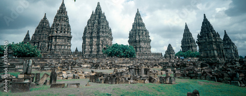 Yogyakarta Indonesia June, 08 2020: Prambanan temple is a Hindu temple compound included in world heritage list in the night. Monumental ancient architecture, carved stone walls. photo