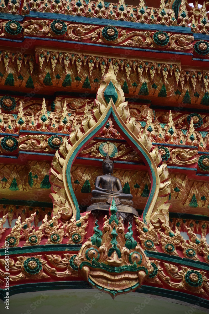 Buddha enshrined on the temple arch
