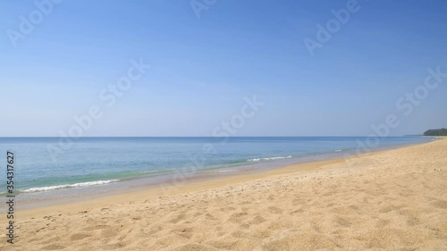 Wallpaper Mural Vibrant colored beach with bright yellow san, clean blue water and clear sky in hot sunny day in tropical island Torontodigital.ca