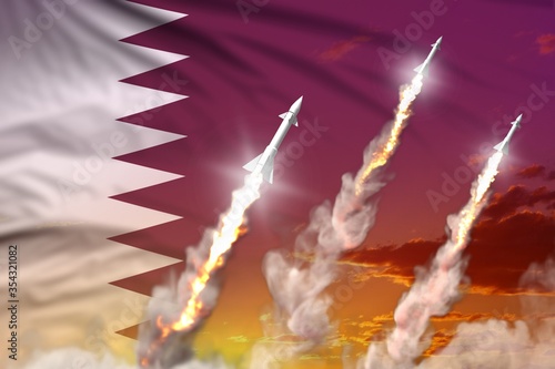 Modern strategic rocket forces concept on sunset background, Qatar ballistic warhead attack - military industrial 3D illustration, nuke with flag photo