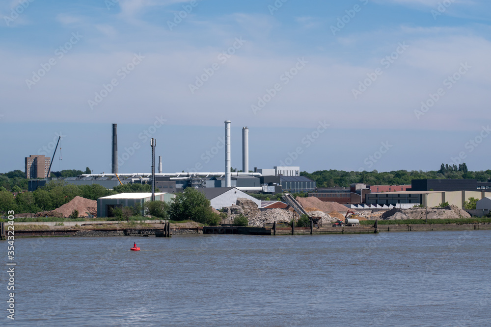 Heavy industry in the port of Antwerp in the rive Scheldt. Belgium