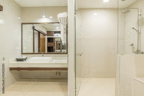 Modern bathroom interior with washbasin and bathtub  luxury shower decoration for home and living or hotel contemporary