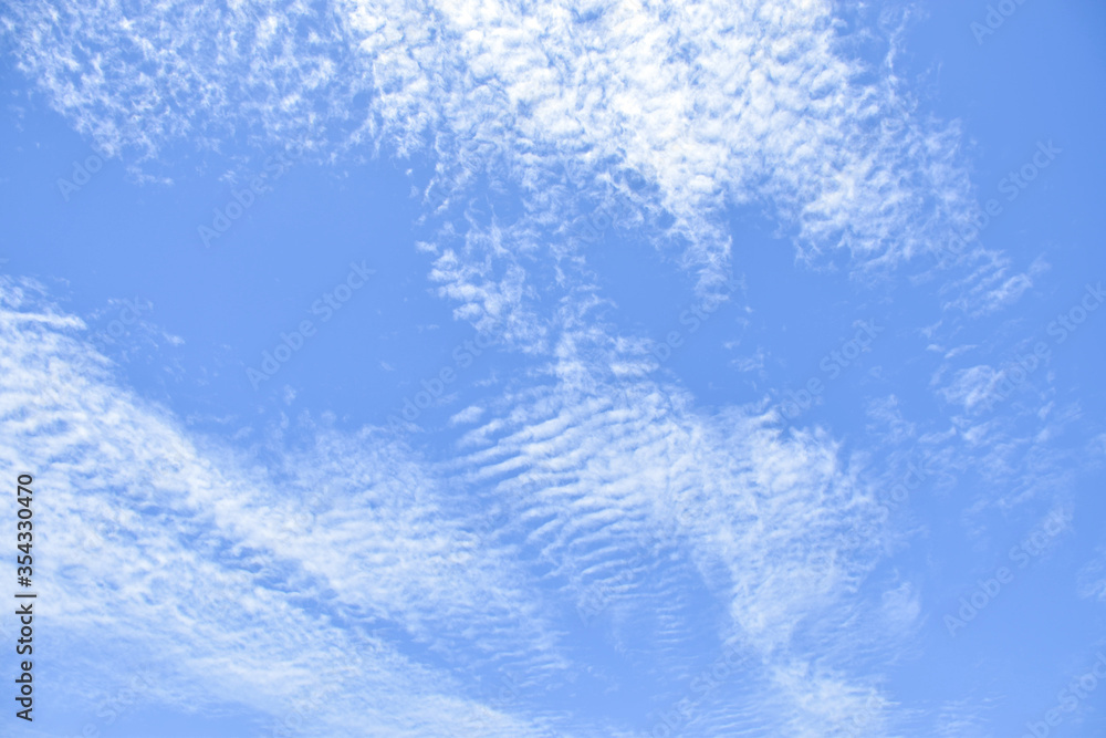 altocumulus clouds like fluff float in the sky. altocumulus clouds like fluff float in the sky.