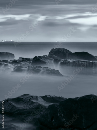 Sea rocks at dusk