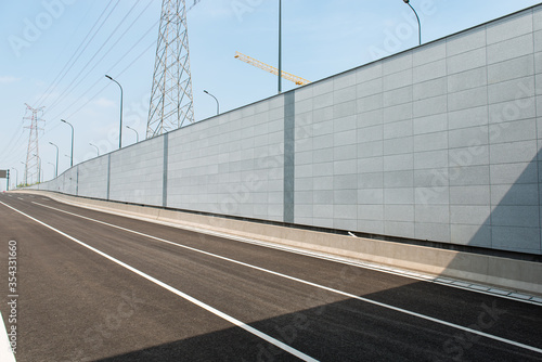 Clear sky, city highway underpass entrance