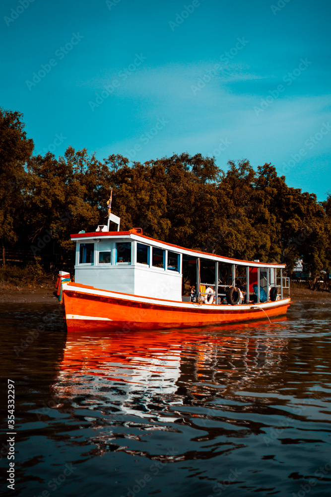 Naklejka premium Passenger boats crossing the Chao Phraya River