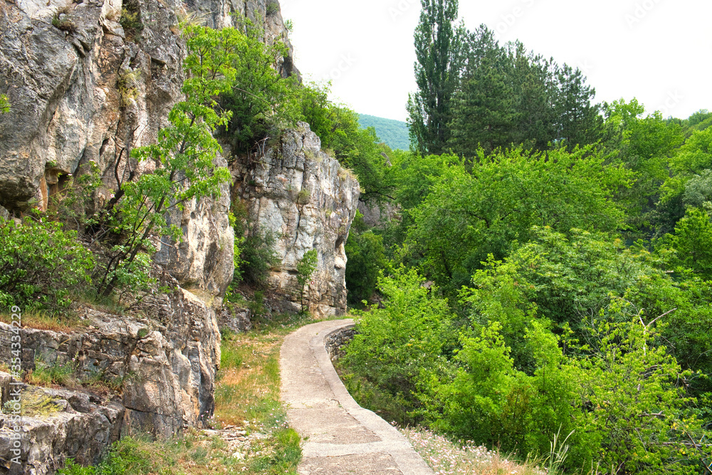 Amazing mountain landscape - beautiful trekking trail among the rocks in the Lazarev canyon in Eastern Serbia