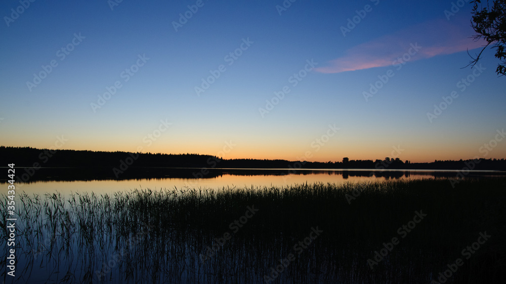 Sunset on lake near Saint-Petersburg, Rusia Sunset on lake near Saint-Petersburg, Rusia