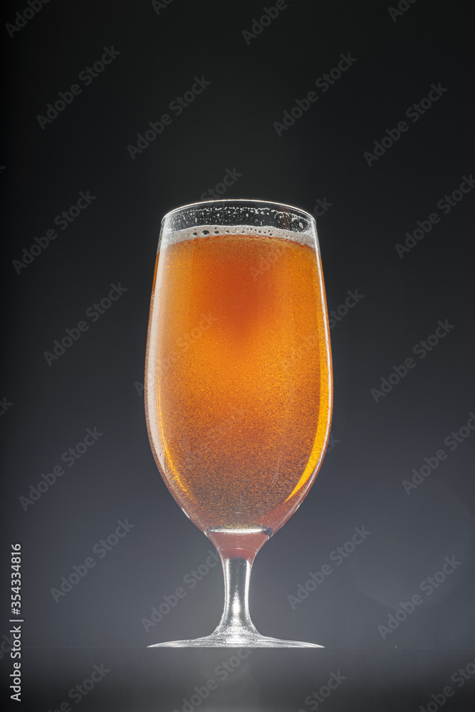 Glass of beer on black background, copy space Glass of beer on black background, copy space