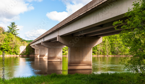 A bridge over the Allegheny River on State Route 62 in Warren County, Pennsylvania, USA on a sunny spring day