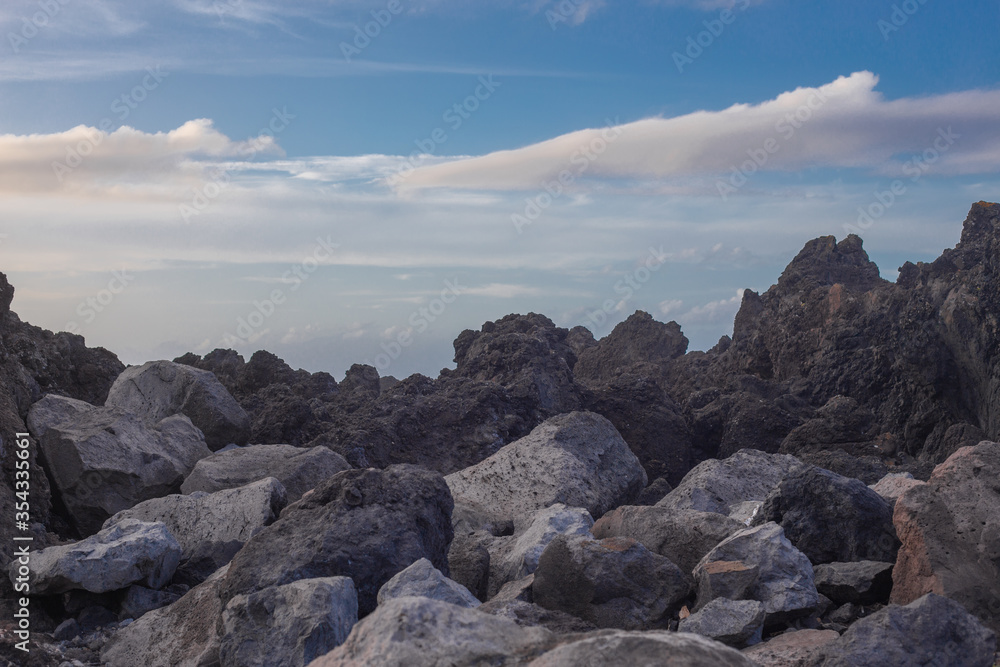 Lava stones on the beach of Piscinas Naturais Biscoitos. Atlantic Ocean. Terceira Azores, Portugal. Lava stones on the beach of Piscinas Naturais Biscoitos. Atlantic Ocean. Terceira Azores, Portugal.