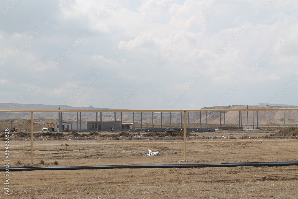 Fototapeta premium Oil pipes in a petrochemical plant during the production of oil and gas